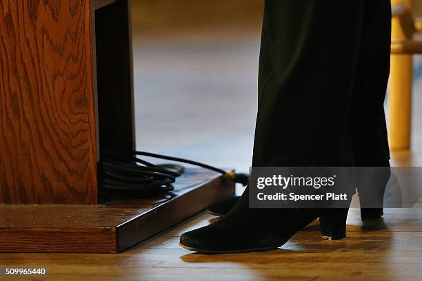 Democratic presidential candidate Hillary Clinton's shoes are viewed as she speaks to voters in South Carolina a day after her debate with rival...