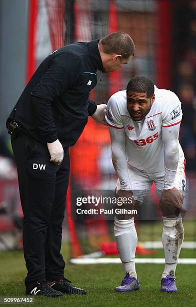 Glen Johnson of Stoke City walks outside the pitch as he received the medical treatment during the Barclays Premier League match between A.F.C....