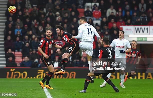 Joselu of Stoke City heads the ball to score his team's third goal during the Barclays Premier League match between A.F.C. Bournemouth and Stoke City...