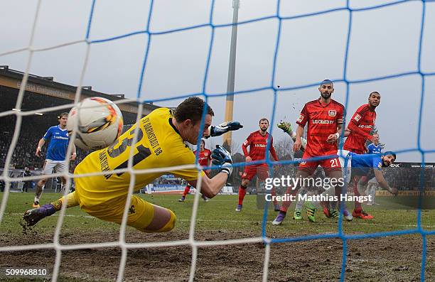 Oemer Toprak of Leverkusen scores his team's first goal during the match between SV Darmstadt 98 and Bayer Leverkusen at Merck-Stadion am...