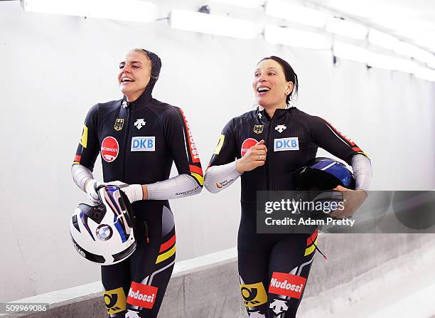 Anja Schneiderheinze and Annika Drazek of Germany celebrate victory after their fourth run during Day 2 of the IBSF World Championships for Bob and...