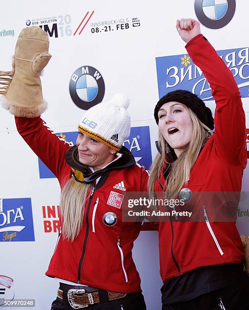 Kaillie Humphries and Melissa Lotholz of Canada celebrate second place after their fourth run in the Women's Bobsleigh during Day 2 of the IBSF World...