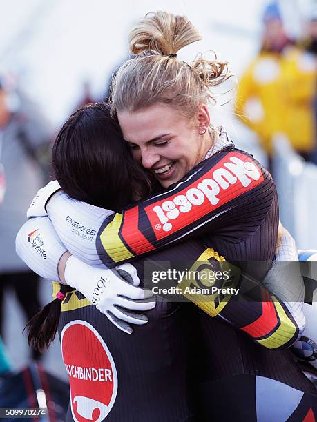 Anja Schneiderheinze and Annika Drazek of Germany celebrate victory after their fourth run in the Women's Bobsleigh during Day 2 of the IBSF World...