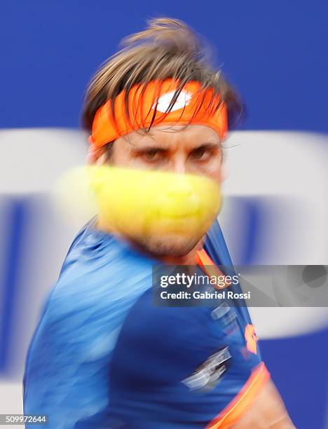 David Ferrer of Spain takes a backhand shot during a match between Pablo Cuevas of Uruguay and David Ferrer of Spain as part of ATP Argentina Open at...