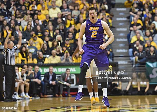 Forward Klint Carlson of the Northern Iowa Panthers celebrates after scoring a three-pointer against the Wichita State Shockers during the first half...