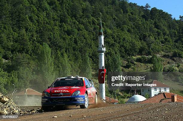 Sebastien Loeb and Daniel Elena of France drive their Citroen Xsara WRC, Citroen Total, A/8 during the Rally of Turkey 2004, Leg 1 on June 25, 2004...