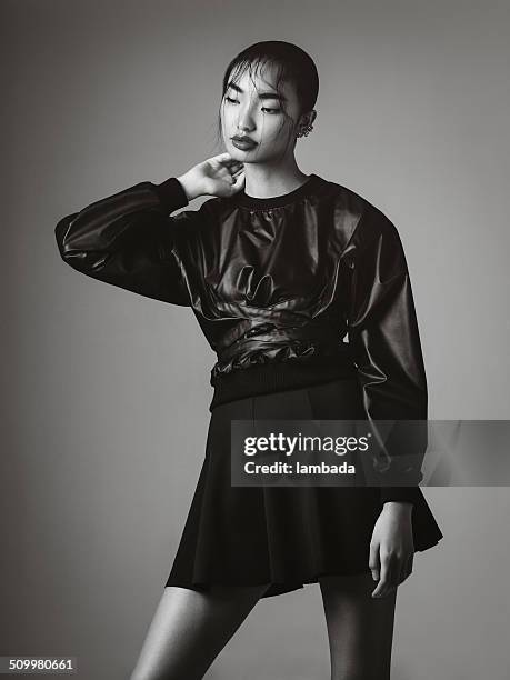 asian fashionable woman - female model hair bun stock pictures, royalty-free photos & images