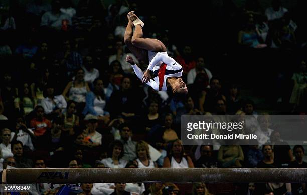 Annia Hatch flips over the balance bean during the Women's preliminaries of the U.S. Gymnastics Olympic Team Trials on June 25, 2004 at The Arrowhead...