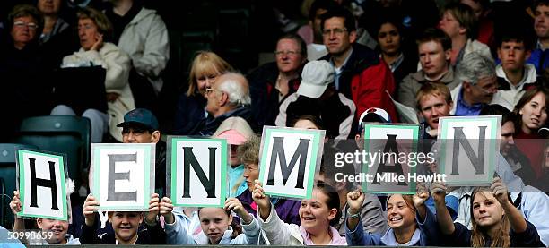 Tim Henman fans on centre court on day 6 at the Wimbledon Lawn Tennis Championship on June 26, 2004 at the All England Lawn Tennis and Croquet Club...