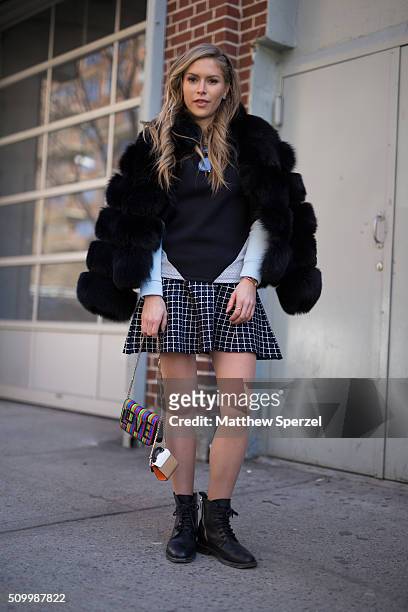 Maja Malnar is seen at Jill Stuart wearing Inverno Caso coat, Jill Stuart dress, Topshop shirt, and Les Petitrs Joures bag during New York Fashion...