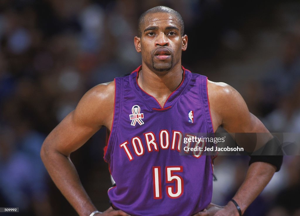 Vince Carter looks on