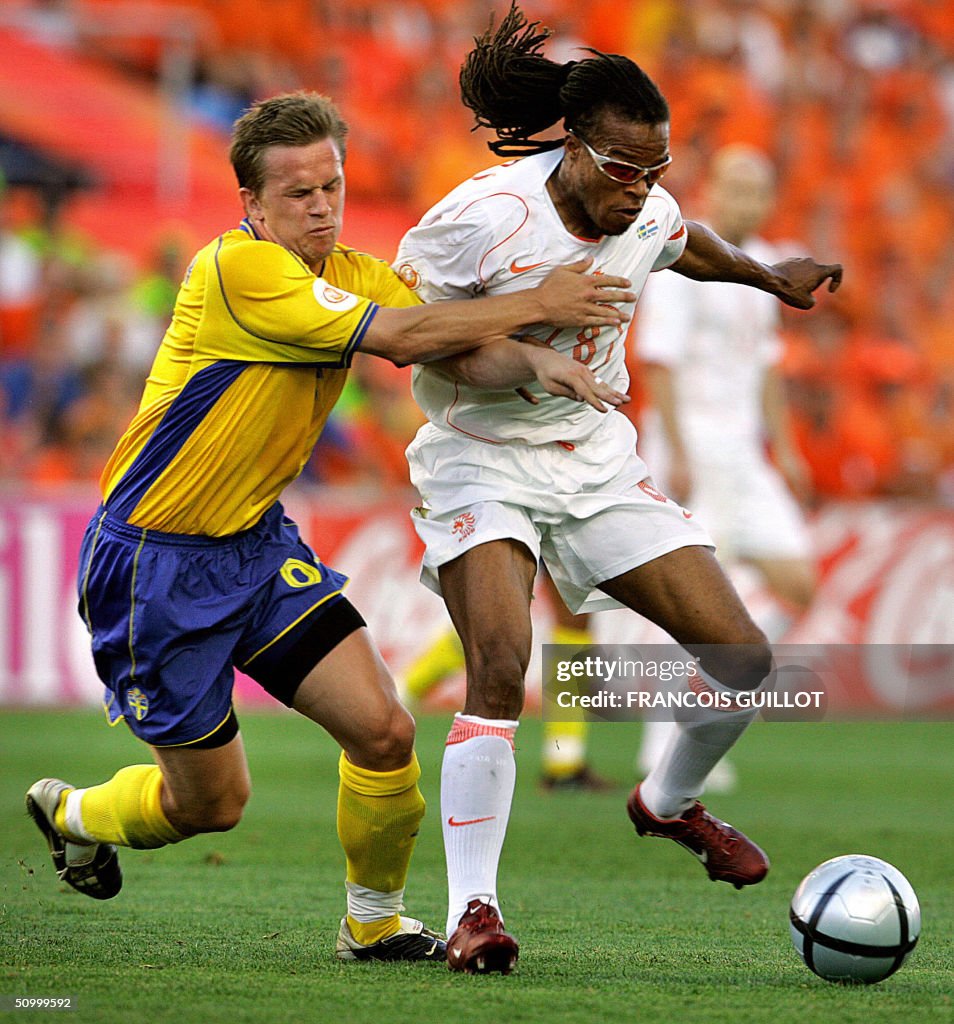 Swedish midfielder Anders Svensson (L) v