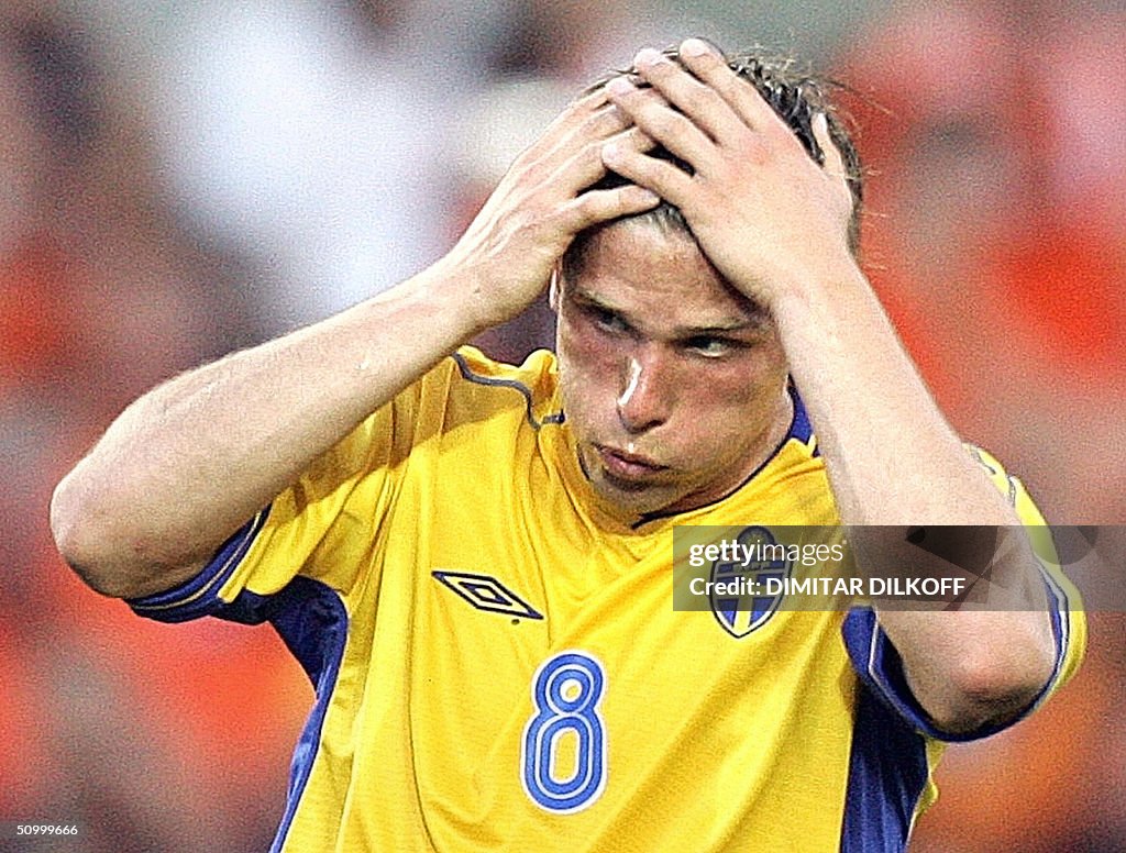 Swedish midfielder Anders Svensson takes