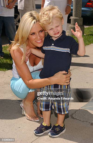 Actress Jenny McCarthy and her son Evan Asher arrive at the opening of Nana's Garden on June 26, 2004 at Nana's Garden in Los Angeles, California....