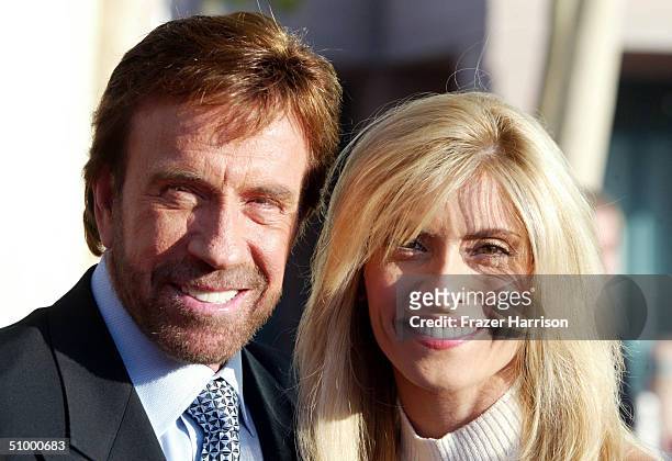 Actor Chuck Norris and his wife Gena O'Kelley arrive at the Academy of Television Arts and Sciences Hall of Fame Induction Ceremony on June 26, 2004...