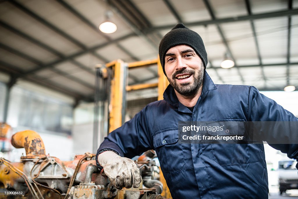 Happiness mechanic on a garage