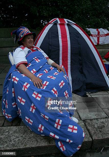 Fans camp out overnight in the queue for middle Saturday at the Wimbledon Lawn Tennis Championship on June 26, 2004 at the All England Lawn Tennis...