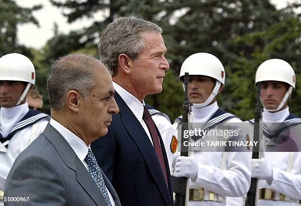 President George W. Bush and Turkish President Ahmet Necdet Sezer Are seen during a military welcome ceremony in front of Presidency residence in...