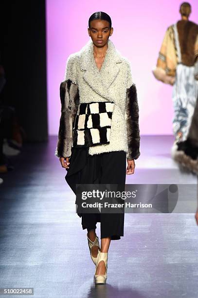 Model walks the runway wearing Son Jung Wan Fall 2016 during New York Fashion Week: The Shows at The Dock, Skylight at Moynihan Station on February...