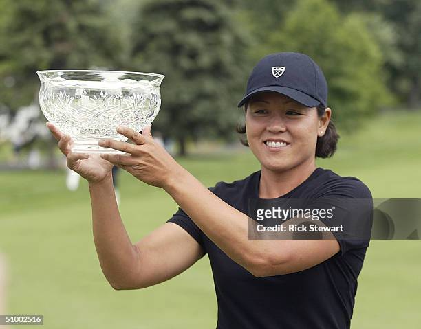Kim Saiki holds the Stueben Glass bowl after winning the Wegmans Rochester LPGA at Locust Hill Country Club in Pittsford, New York. It was Saiki's...