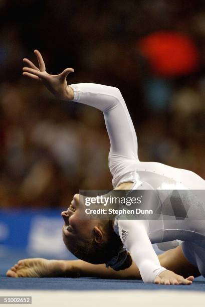 Courtney McCool poses at the end of her floor exercise during the Women's finals of the U.S. Gymnastics Olympic Team Trials on June 27, 2004 at The...