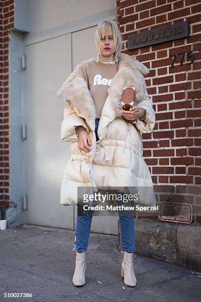 Linda Tol is seen at Jill Stuart wearing Fendi coat, Aspinal bag, Lacoste sweater, and Zara shoes during New York Fashion Week: Women's Fall/Winter...