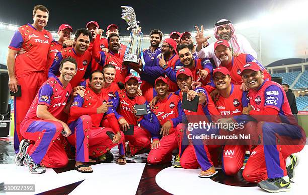 The Gemini Arabians players and staff pose with the trophy following their victory at the end of the Final match of the Oxigen Masters Champions...