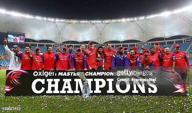 The Gemini Arabians players and staff pose with the trophy following their victory at the end of the Final match of the Oxigen Masters Champions...