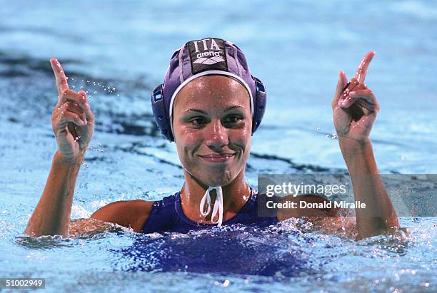 Tania Di Mario of Italy celebrates her winning goal in Italy's 15-14 shootout win over Russia during the 3rd place game in the 2004 FINA Women's...