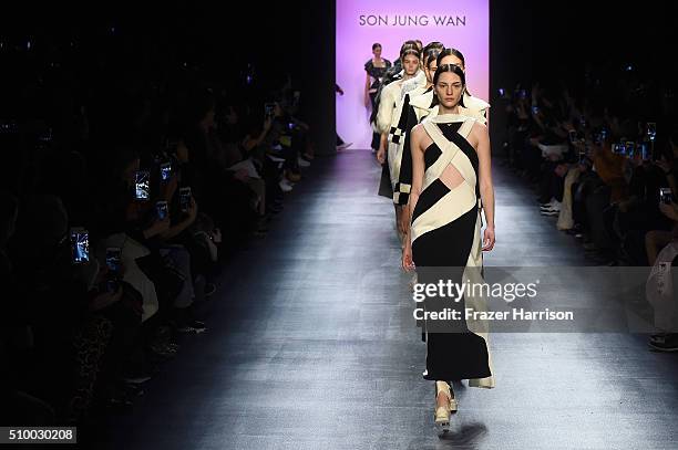 Models walk the runway wearing Son Jung Wan Fall 2016 during New York Fashion Week: The Shows at The Dock, Skylight at Moynihan Station on February...