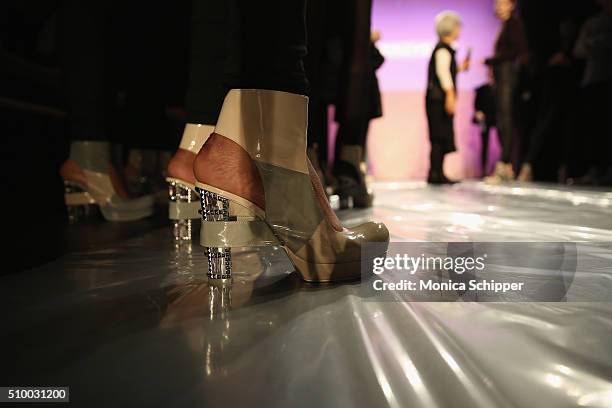 Models prepare backstage at the Son Jung Wan Fall 2016 fashion show during New York Fashion Week: The Shows at The Dock, Skylight at Moynihan Station...