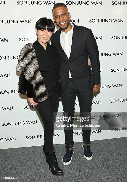 Son Jung Wan and Eric West pose backstage at the Son Jung Wan Fall 2016 fashion show during New York Fashion Week: The Shows at The Dock, Skylight at...