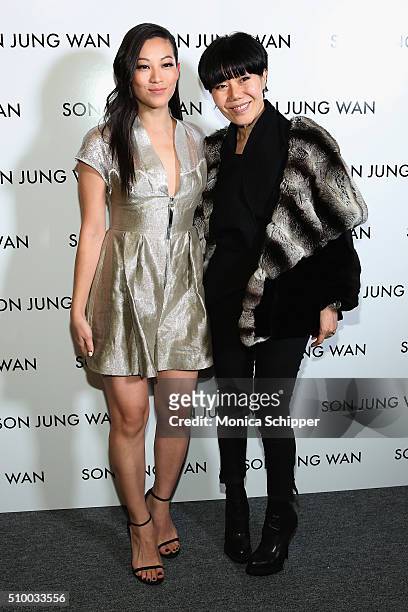 Actress Arden Cho and designer Son Jung Wan pose backstage at the Son Jung Wan Fall 2016 fashion show during New York Fashion Week: The Shows at The...