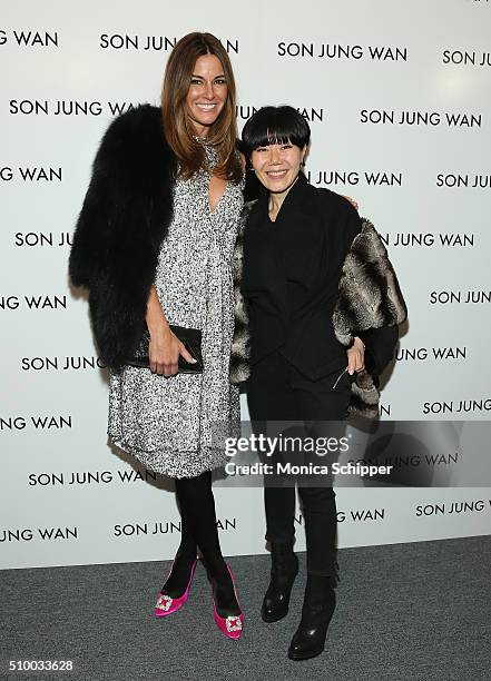 Kelly Killoren Bensimon and designer Son Jung Wan pose backstage at the Son Jung Wan Fall 2016 fashion show during New York Fashion Week: The Shows...