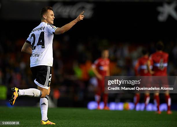 Denis Cheryshev of Valencia celebrates scoring his team's second goal during the La Liga match between Valencia CF and RCD Espanyol at Estadi de...