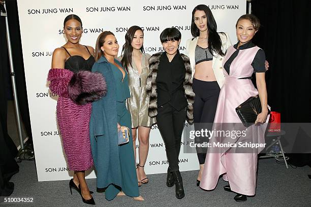 Vicky Jeudy, Adrienne Bailon, Arden Cho, Son Jung Wan, Carmen Carrera, and Jeannie Mai pose backstage at Son Jung Wan Fall 2016 fashion show during...