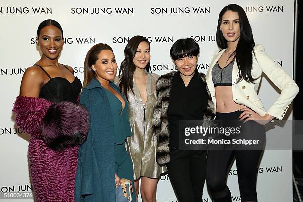 Vicky Jeudy, Adrienne Bailon, Arden Cho, Son Jung Wan, and Carmen Carrera pose backstage at Son Jung Wan Fall 2016 fashion show during New York...