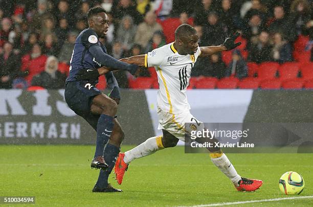 Jean-Kevin Augustin of Paris Saint-Germain in action with Junior Tallo of Lille LOSC during the French Ligue 1 between Paris Saint-Germain and Lille...