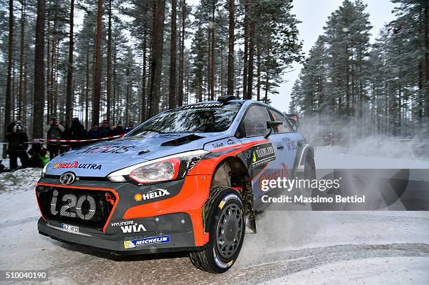 Thierry Neuville of Belgium and Nicolas Gilsoul of Belgium compete in their Hyundai Motorsport Hyundai i20 WRC during Day Two of the WRC Sweden on...