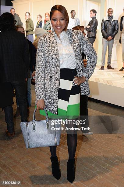 Journalist Alicia Quarles poses at the Banana Republic Fall 2016 fashion show at Highline Stages on February 13, 2016 in New York City.