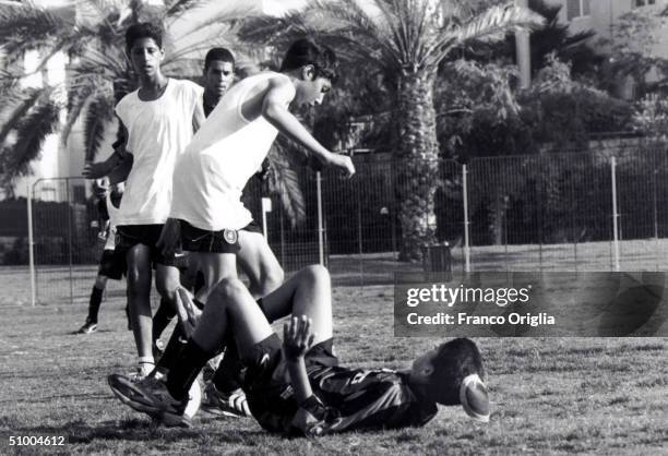 Young footballers involved with Inter Campus Project play during a training session May 20, 2000 in Tel Aviv, Israel. Inter Campus is a social...