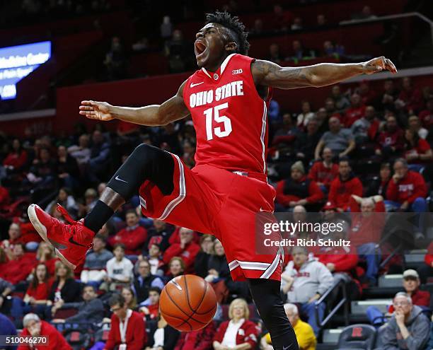 Kam Williams of the Ohio State Buckeyes reacts after a dunk against the Rutgers Scarlet Knights during the first half of a college basketball game at...