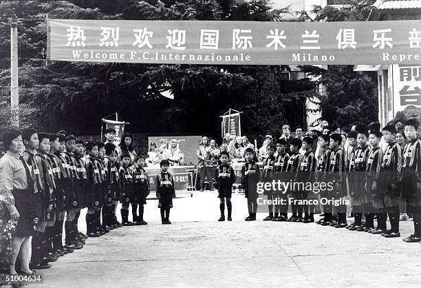 Young footballers involved with Inter Campus Project pose for a photo March 28, 2002 in Qingdao, China. Inter Campus is a social program enacted by...