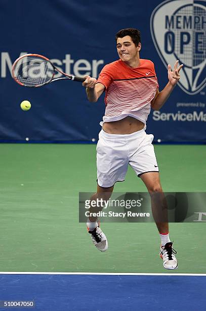 Taylor Fritz of the United States returns a shot to Ricardas Berankis of Lithuania during their semi-final singles match on Day 6 of the Memphis Open...