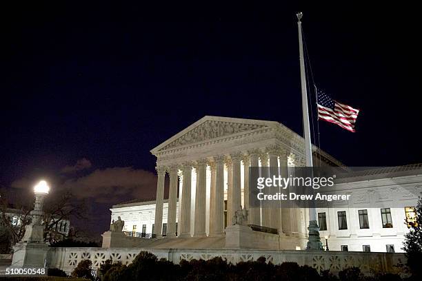 The American flag flies at half mast at the U.S. Supreme Court February 13, 2016 in Washington, DC. Supreme Court Justice Antonin Scalia was at a...