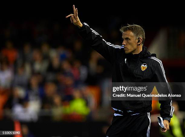 Valencia CF assistant manager Phil Neville gives instructions during the La Liga match between Valencia CF and RCD Espanyol at Estadi de Mestalla on...