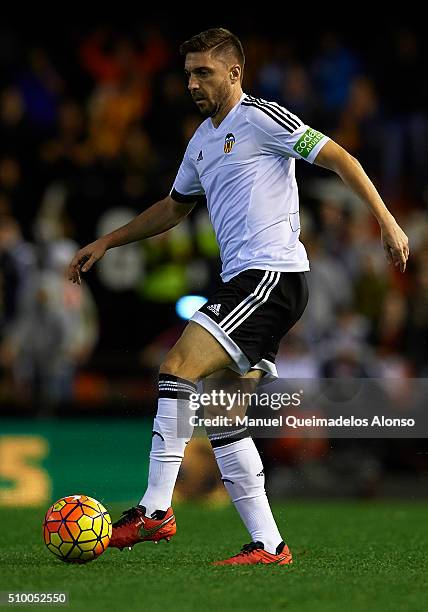 Guilherme Siqueira of Valencia in action during the La Liga match between Valencia CF and RCD Espanyol at Estadi de Mestalla on February 13, 2016 in...