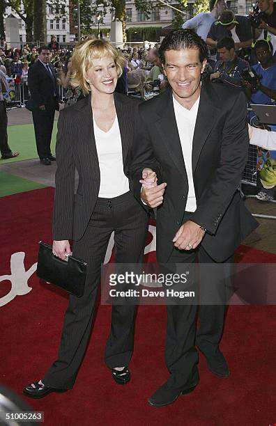 Antonio Banderas and Melanie Griffith arrive at the UK Charity Premiere of "Shrek 2" at the Empire Leicester Square on June 28, 2004 in London. The...