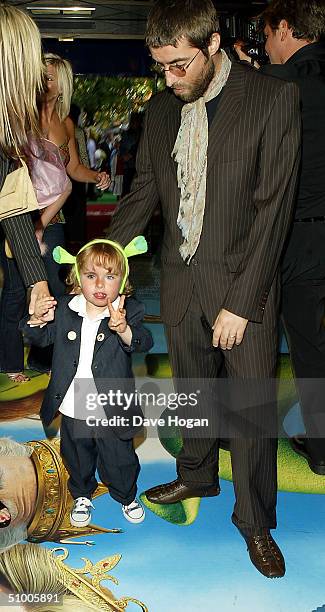 Liam Gallagher, Nicole Appleton and their son Gene Appleton Gallagher arrive at the UK Charity Premiere of "Shrek 2" at the Empire Leicester Square...