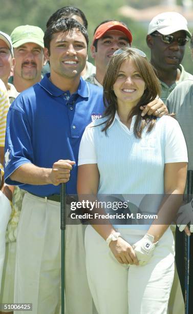 Boxer Oscar De La Hoya and his wife Millie Corretjer attend the Fifth Annual Oscar De La Hoya Celebrity Golf Classic at the North Ranch Country Club...